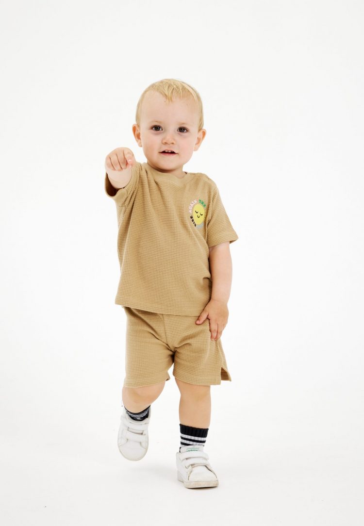 Solid-coloured beige baby shorts - The New